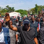 Atiku in a protest Atiku Marches to INEC Headquarters, Leading PDP Rally in Abuja